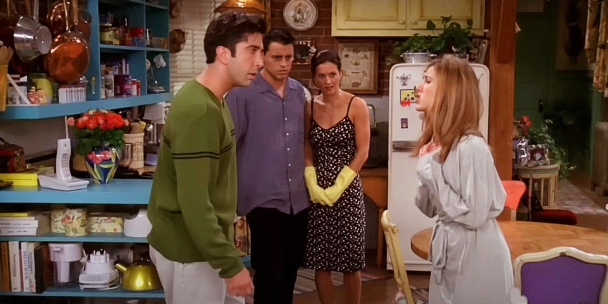 Ross and Rachel fighting in Friends while Joey and Monica watch.