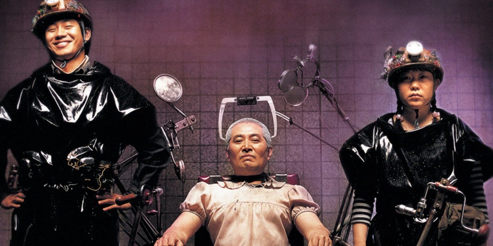 Three men in a room where one has medical equipment attached to him in 'Save the Green Planet!'