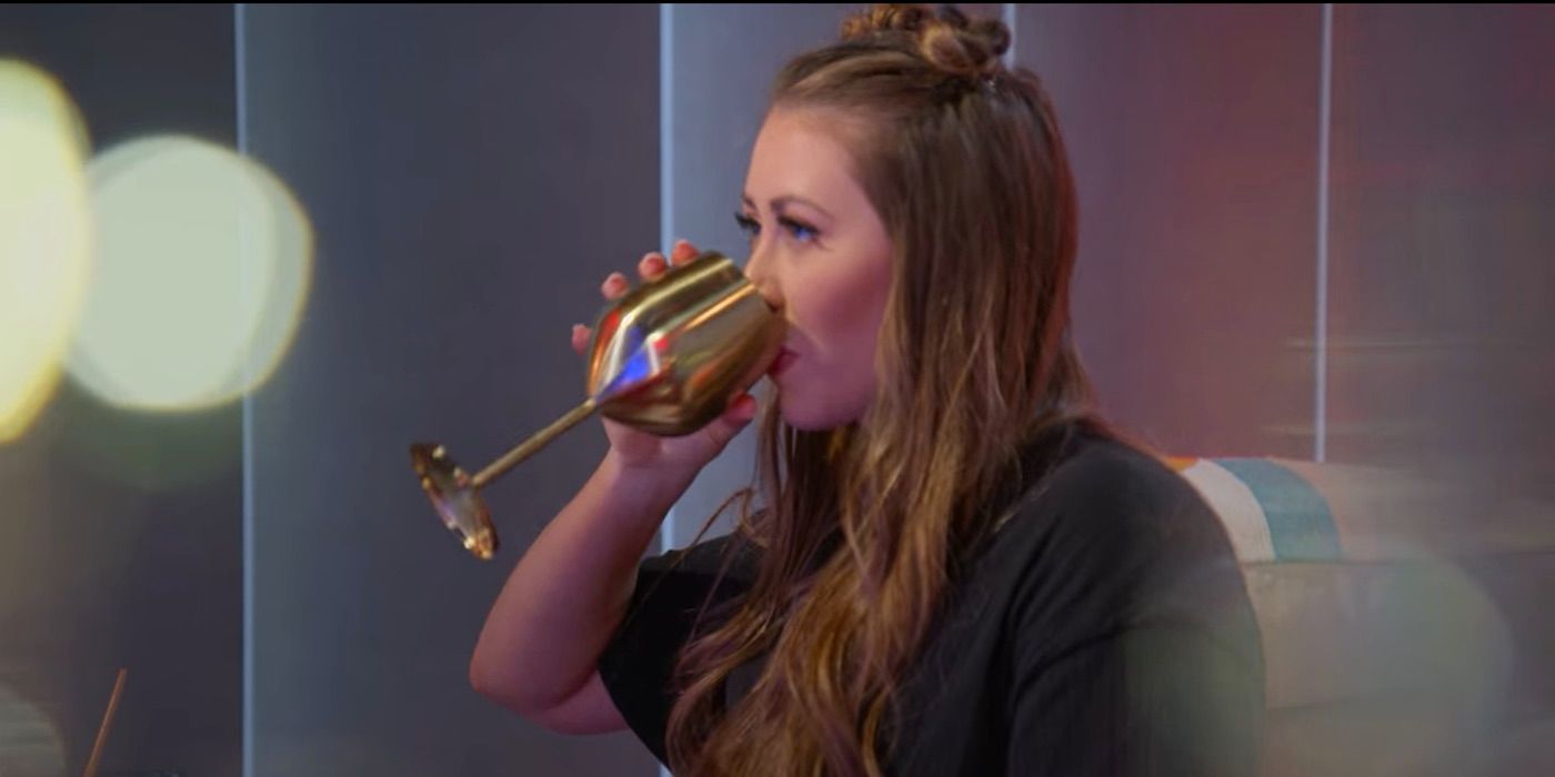 Sarah Anne drinking from her cup on Love is Blind