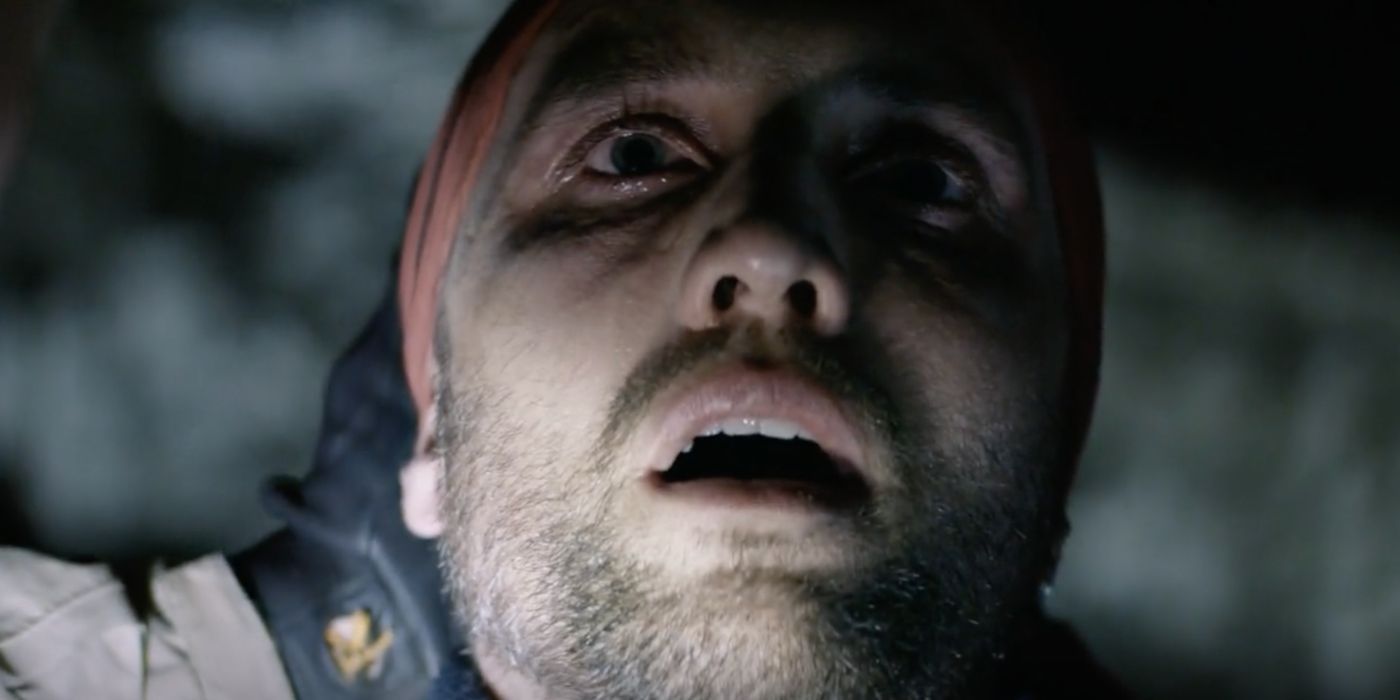 Paul (Aaron Poole) falls into a catatonic state in The Empty Man (2020).