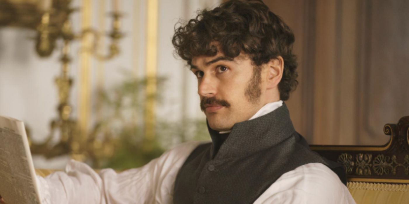 Theo James as Henry Ossery wearing a vest and reading the paper in 'Mr. Malcolm's List'