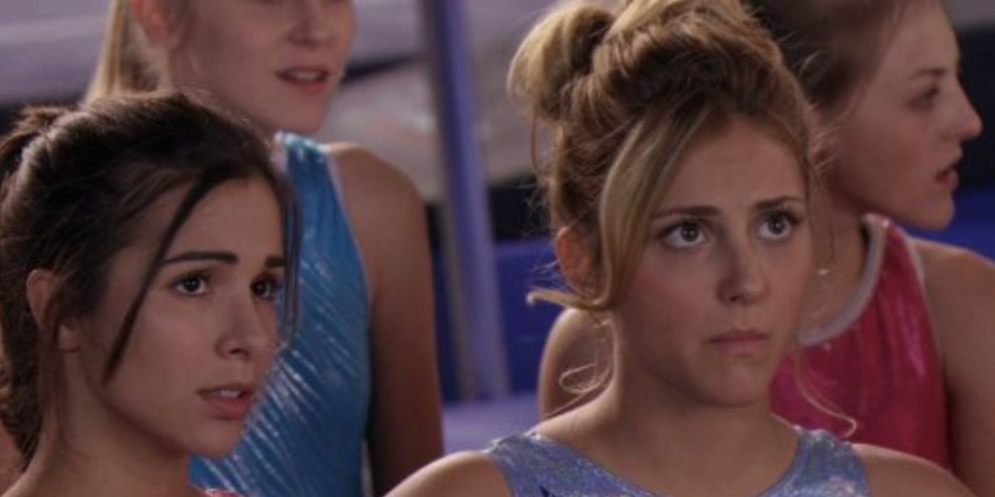 Josie Loren and Cassie Scerbo as Kaylie and Lauren standing in the gym in pony tails in &lsquo;Make it or Break it&rsquo;