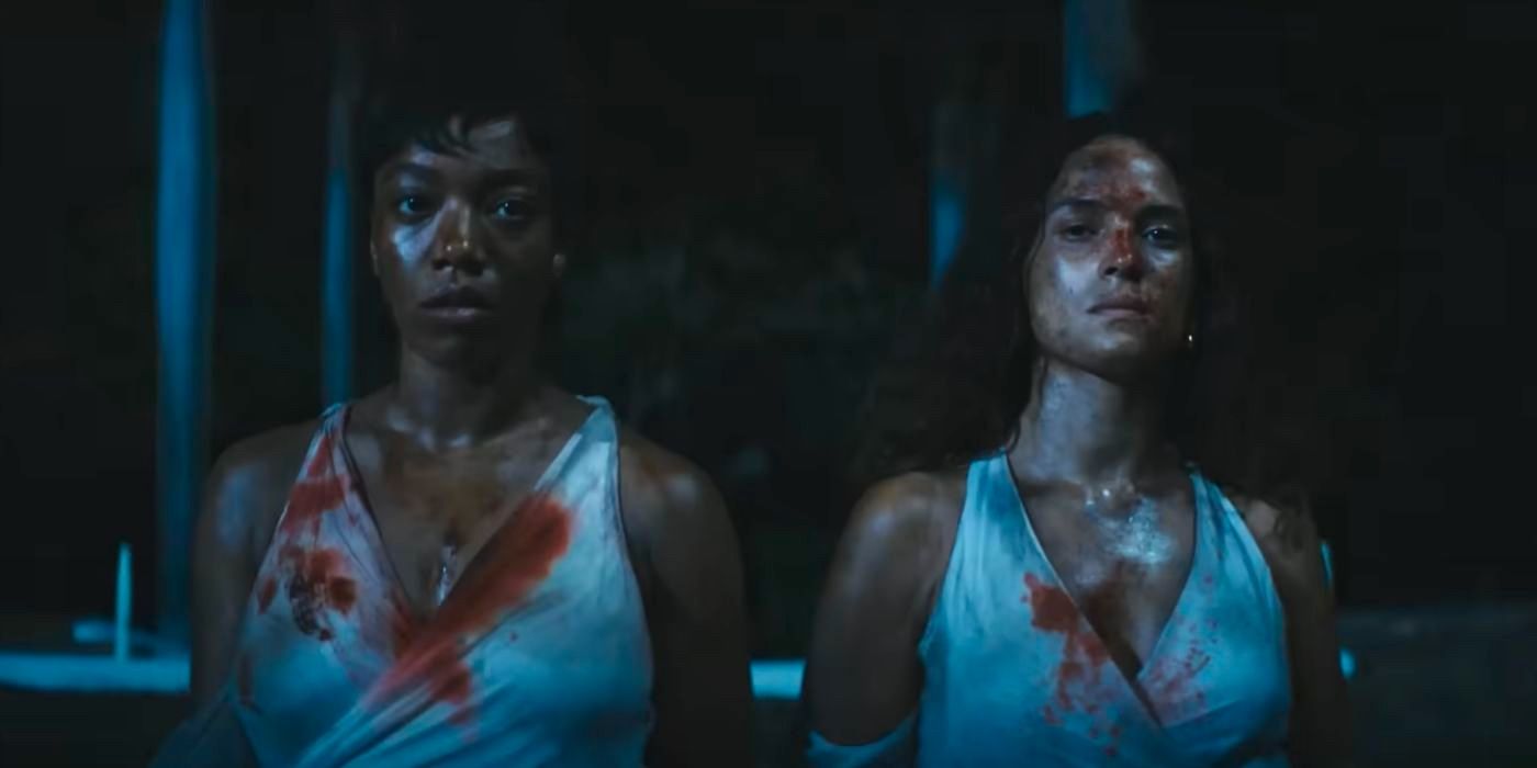 Naomi Ackie and Adria Arjona in the bloody finale of Blink Twice (2024).
