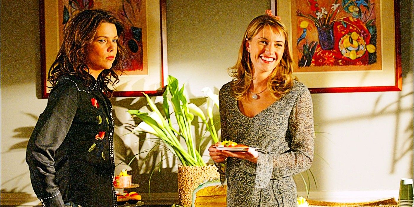 Lorelai and Sherry standing together at Sherry's baby shower in Gilmore Girls