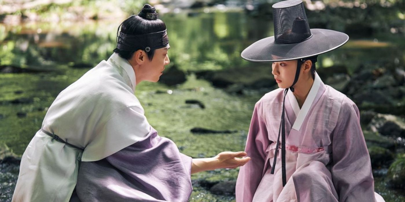 Shin Se-kyung sitting near a river in Captivating the king