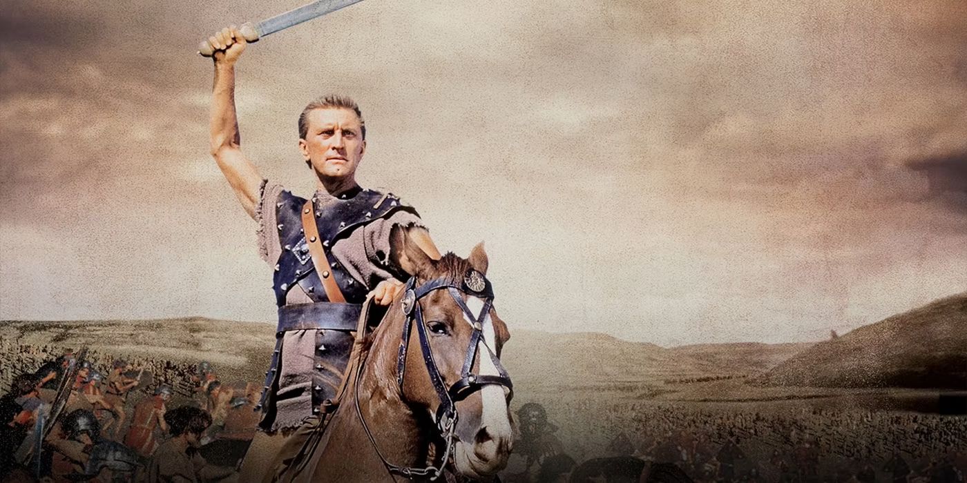 Kirk Douglas holding a sword in the air on the poster for Spartacus (1960)