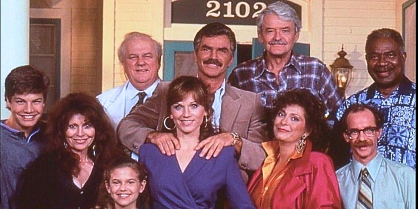 Still image of ensemble cast of 90s sitcom Evening Shade starring Burt Reynolds, Marilu Henner, Michael Jeter, Hal Holbrook, and Ossie Davis