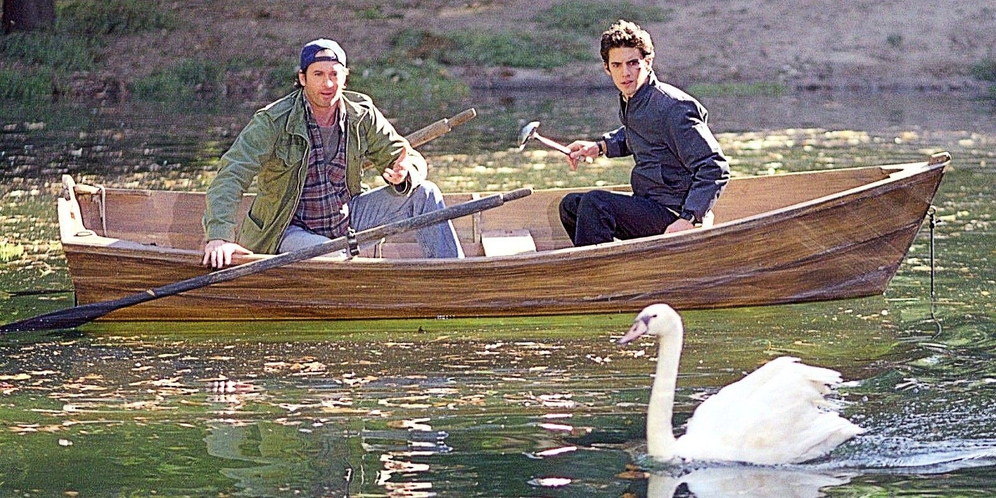 Luke and Jess watching a swan from a canoe in Gilmore Girls