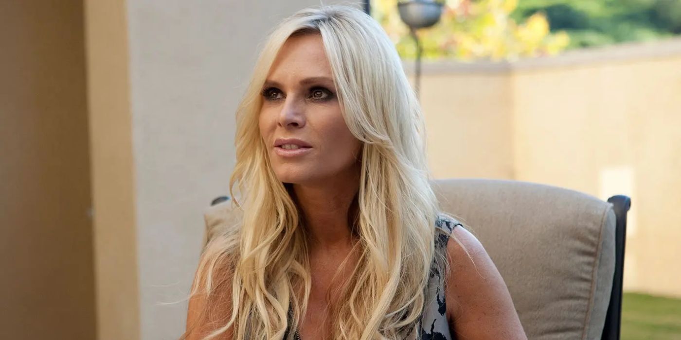 Tamra Judge sits in a chair and looks at someone off camera in The Real Housewives of OC