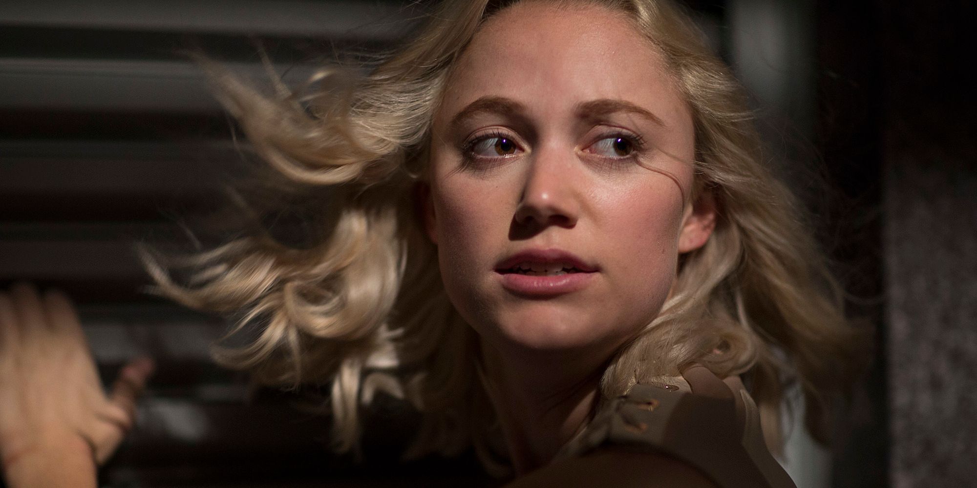 Maika Monroe as Julia in Tau