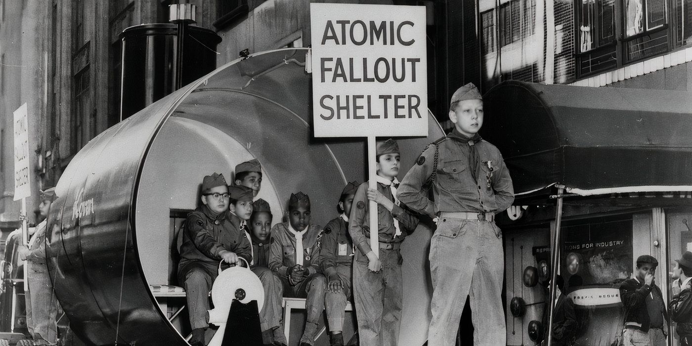 A group of children standing holding a SHELTER sign in the atomic cafe 1