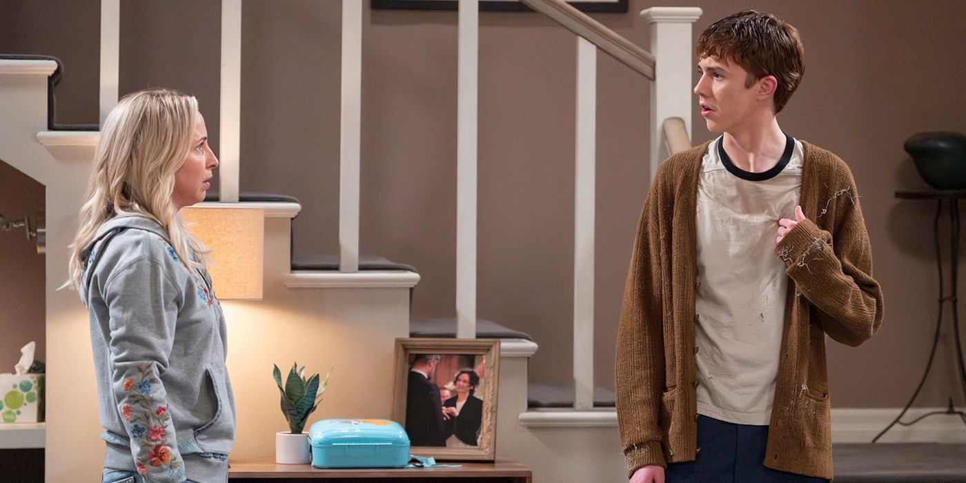 Becky talking to a disheveled Mark in The Conners