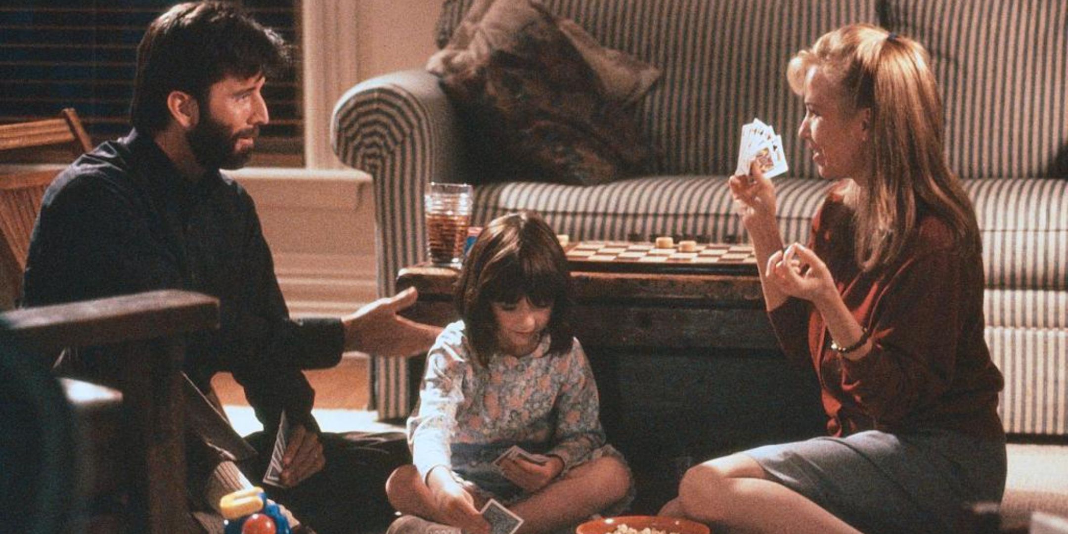 Rebecca De Mornay as Peyton Mott with family in The Hand that Rocks the Cradle.