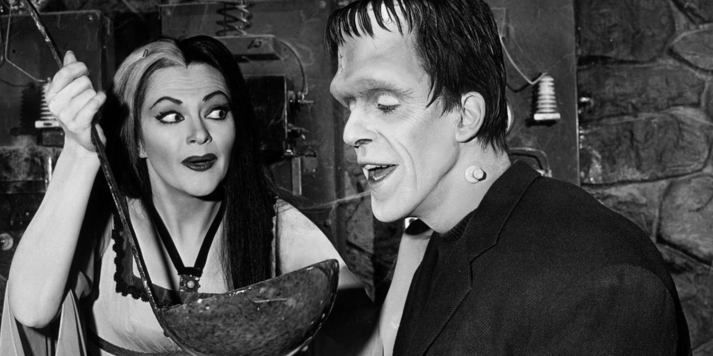 Lily and Herman taste tests something from Lily's Cauldron on an episode of The Munsters