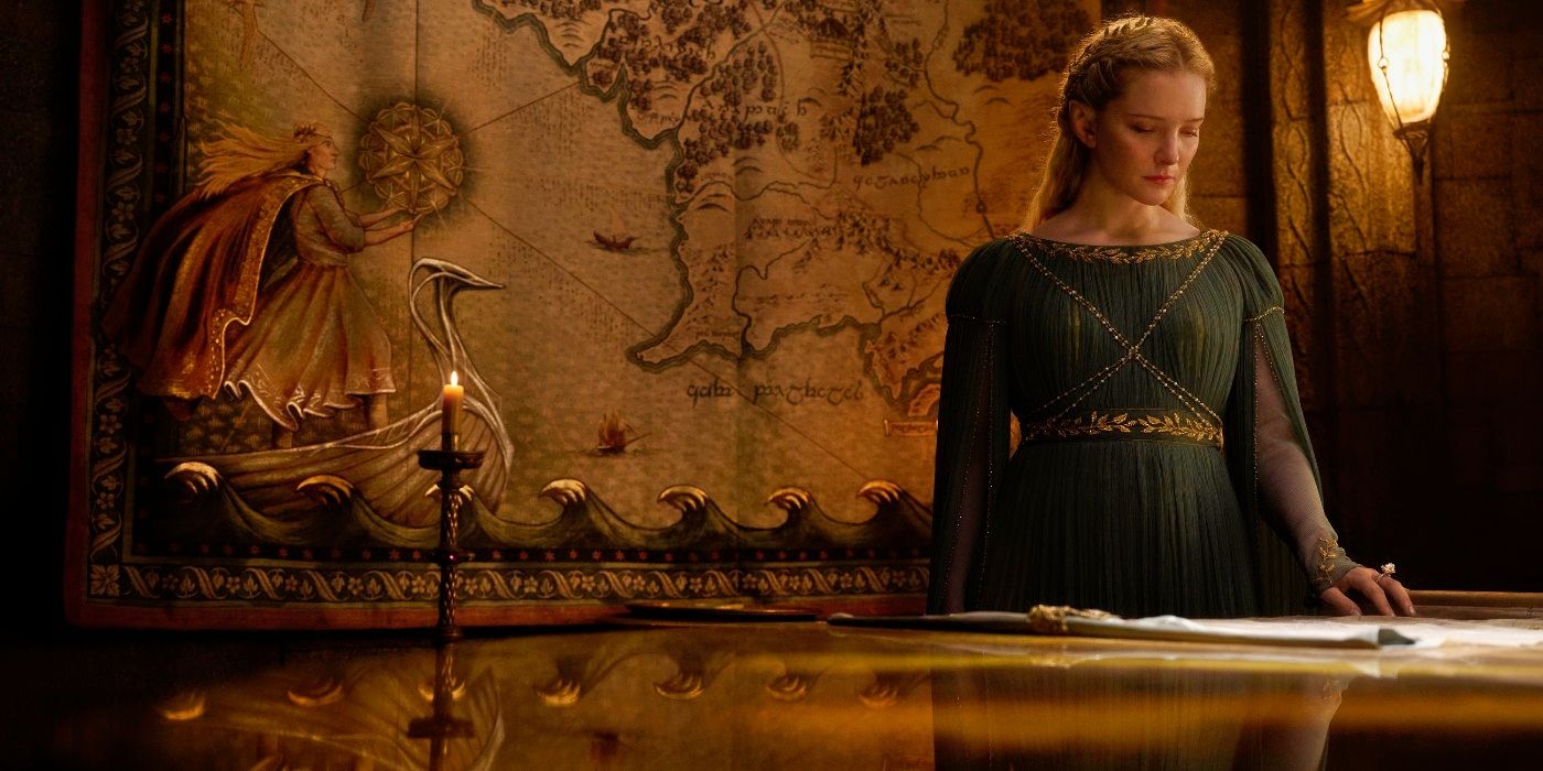 Morfydd Clark looking over a map in The Rings of Power Season 2