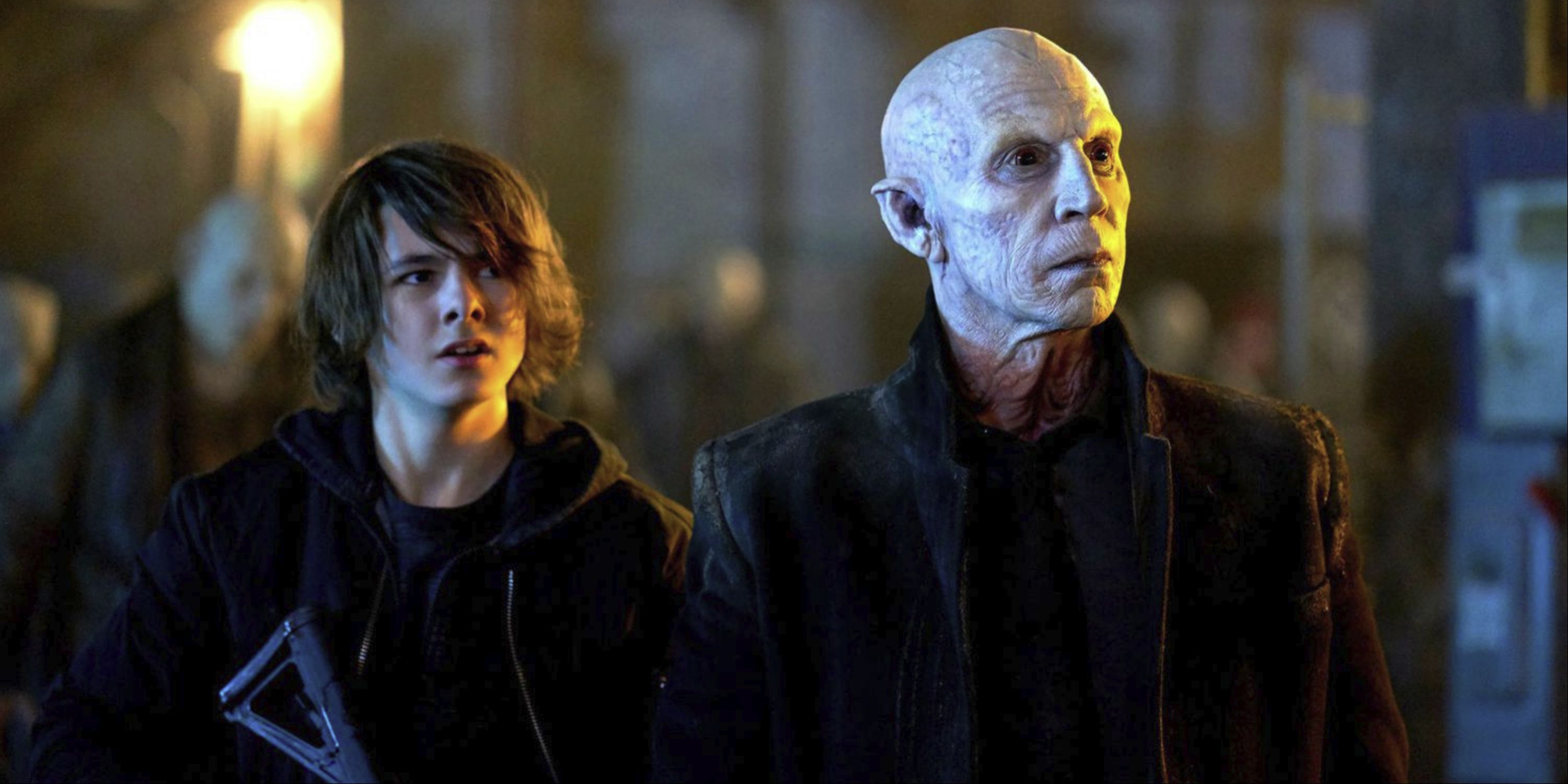 A young man and vampire look up at something in the distance; from The Strain&rsquo;s finale