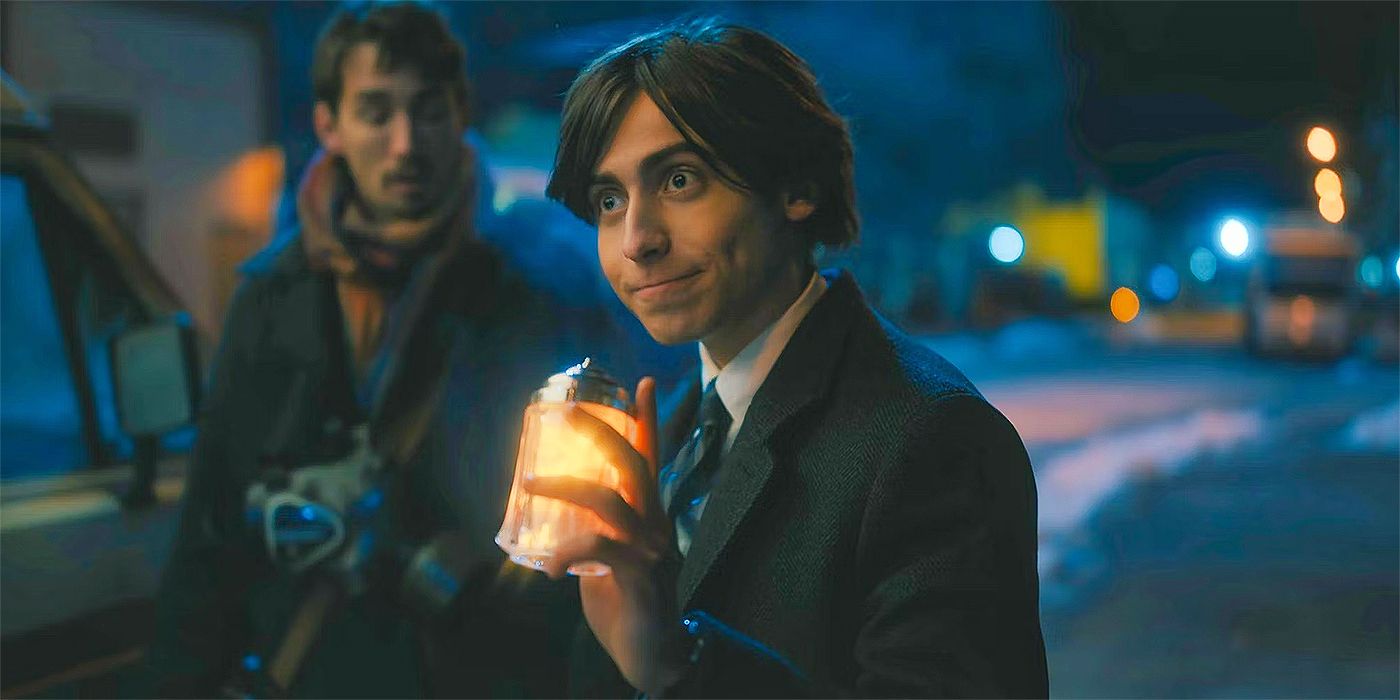 Aidan Gallagher as Five with a jar of Marigold in his hand in The Umbrella Academy Season 4.