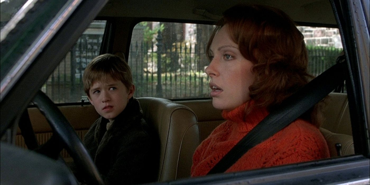 Toni Collette as Lynn Sear with Haley Joel Osment as Cole Sear in a car in The Sixth Sense