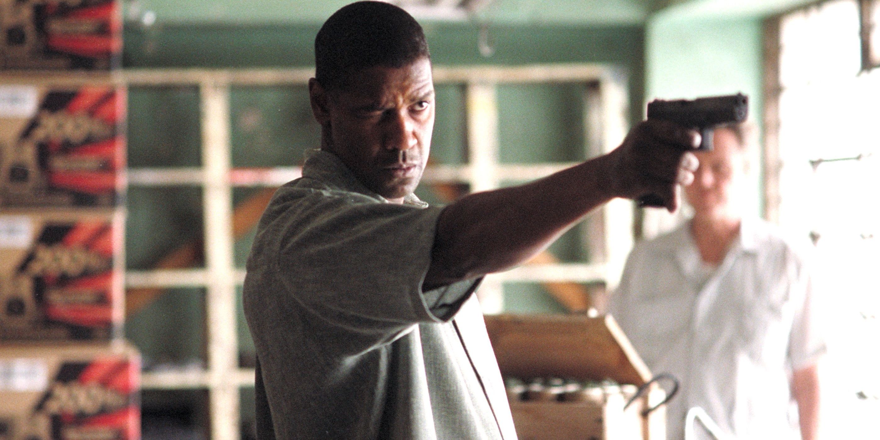 Denzel Washington aiming a handgun in Tony Scott's 'Man on Fire'