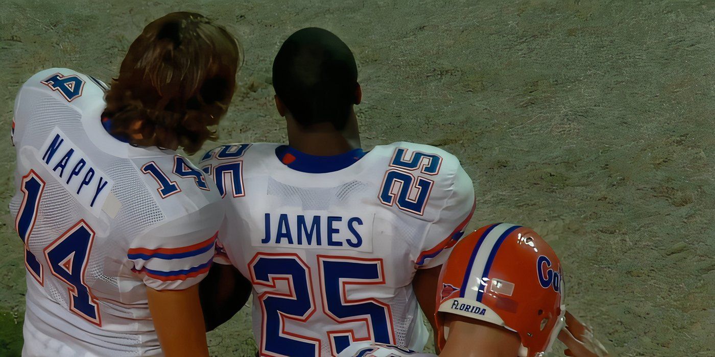 Football player Brandon James stands on the sidelines during a game in his uniform in Untold: Swamp Kings.