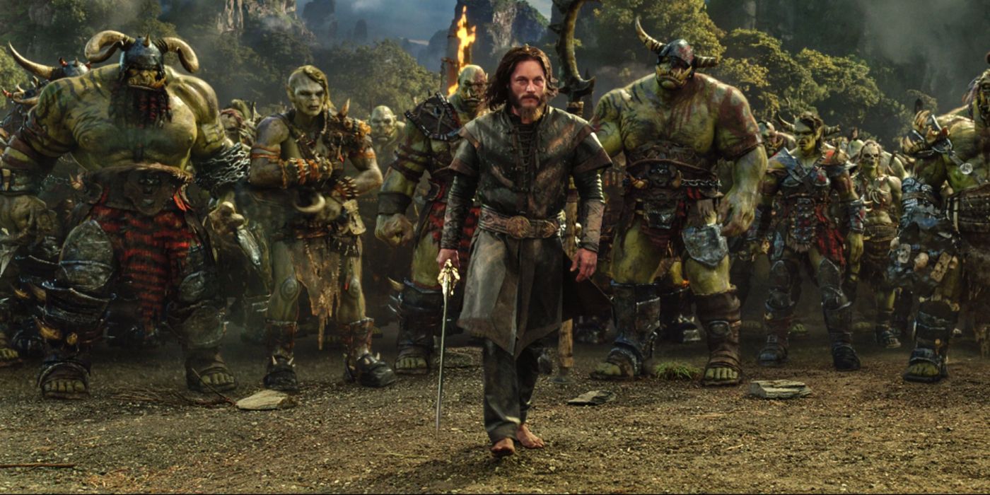 Anduin Lothar (Travis Fimmel) carries his sword as he leads an army of Orcs into battle in 'Warcraft' (2016)Warcraft