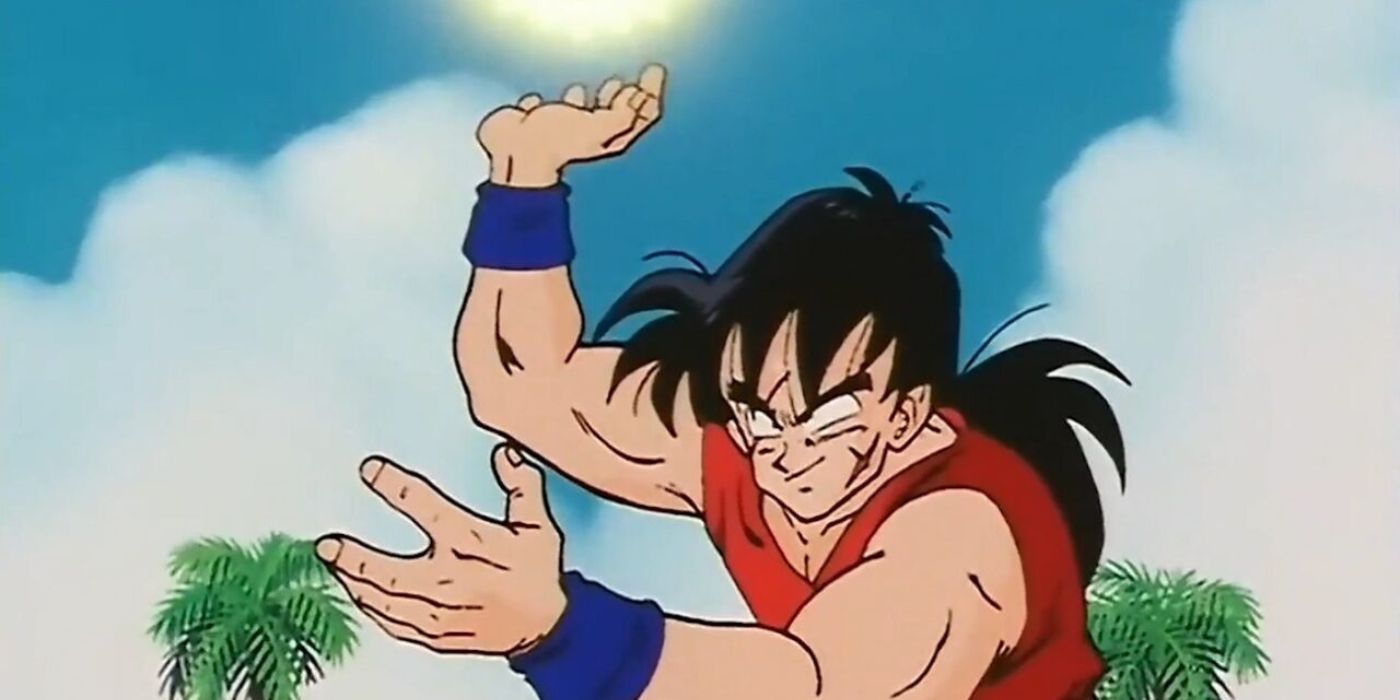 Yamcha holds an orb of light above his head using his Spirit Ball power in Dragon Ball Z.