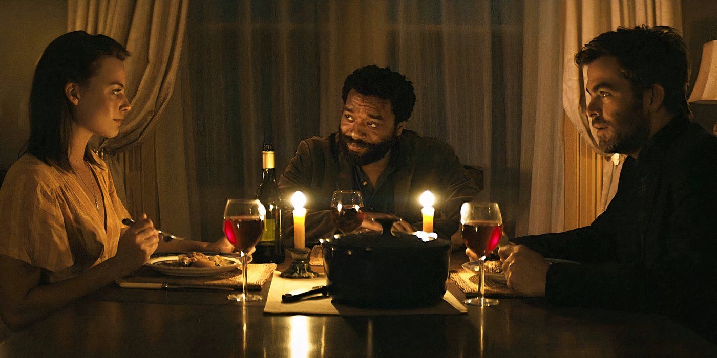 Margot Robbie, Chiwetel Ejiofor, and Chris Pine sit together in 'Z for Zachariah'