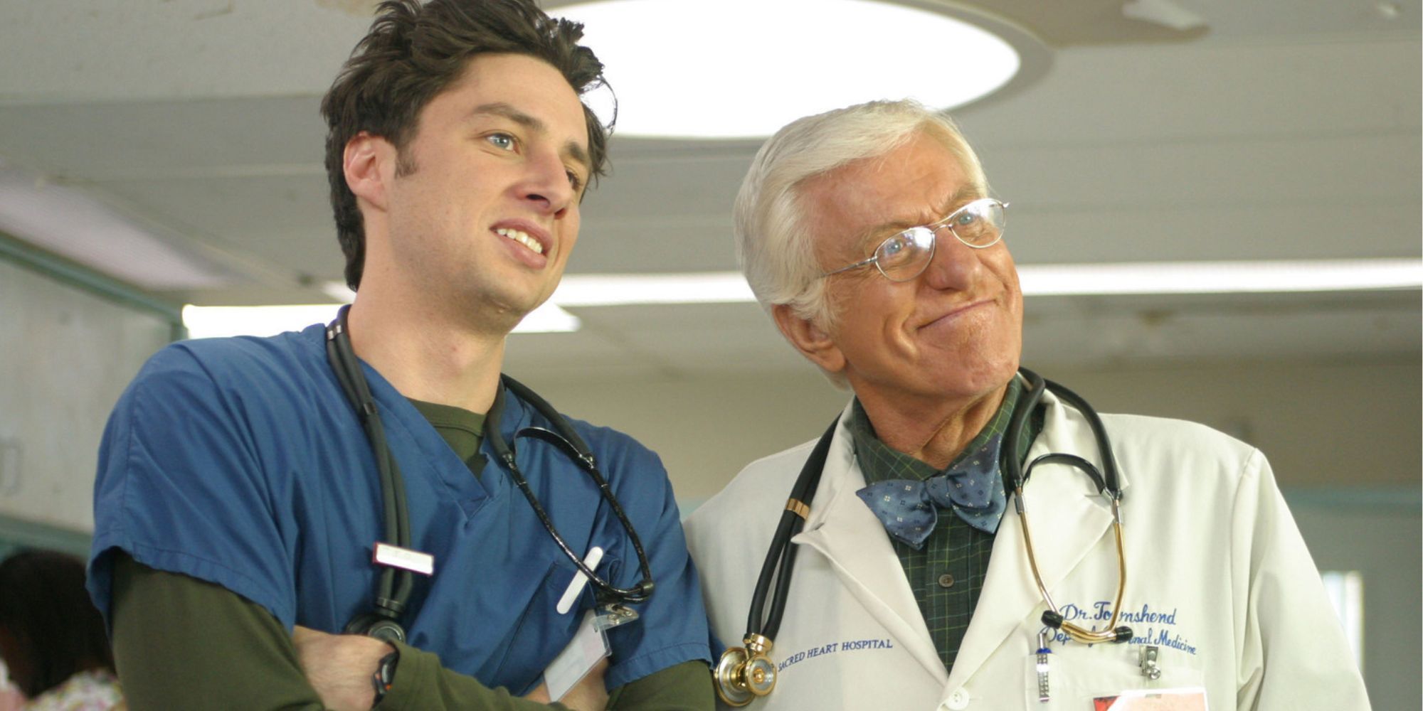 Zach Braff and Dick Van Dyke standing next to each other in Scrubs
