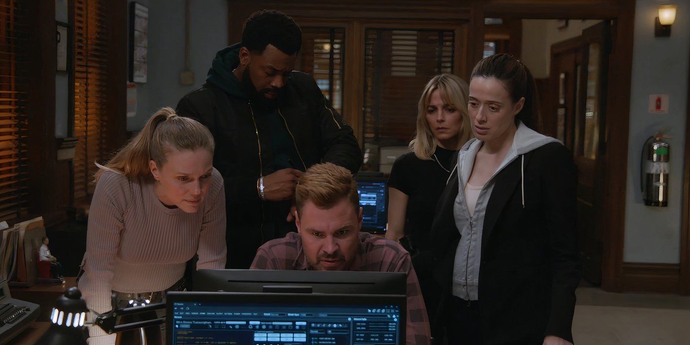 The Chicago P.D. Intelligence unit gathers around a computer.