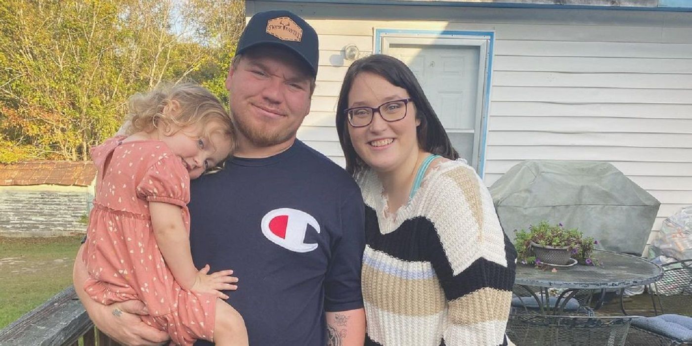 Lauryn "Pumpkin" Efird and Josh Efird with their daughter