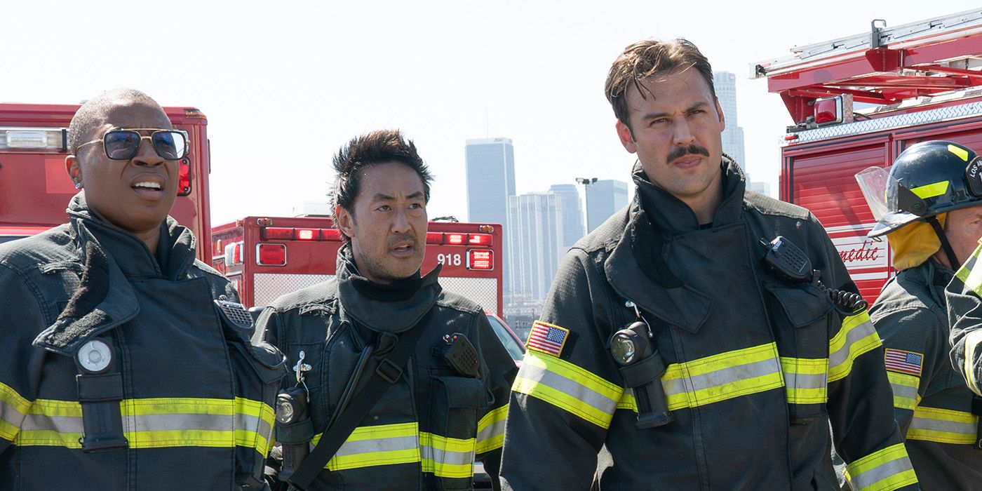 Aisha Hinds, Kenneth Choi, and Ryan Guzman wearing firesuit gear in 9-1-1 Season 8