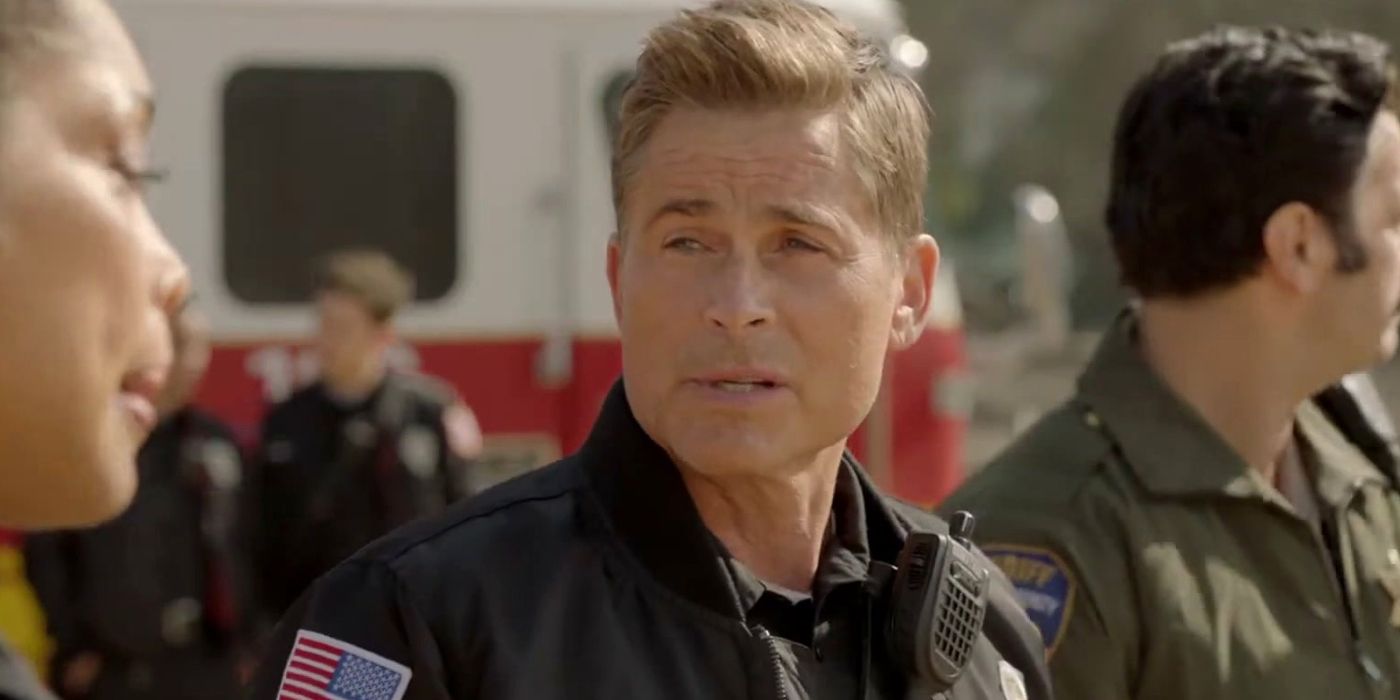 Rob Lowe wears a firefighter work outfit and talks to coworkers in 9-1-1: Lone Star.