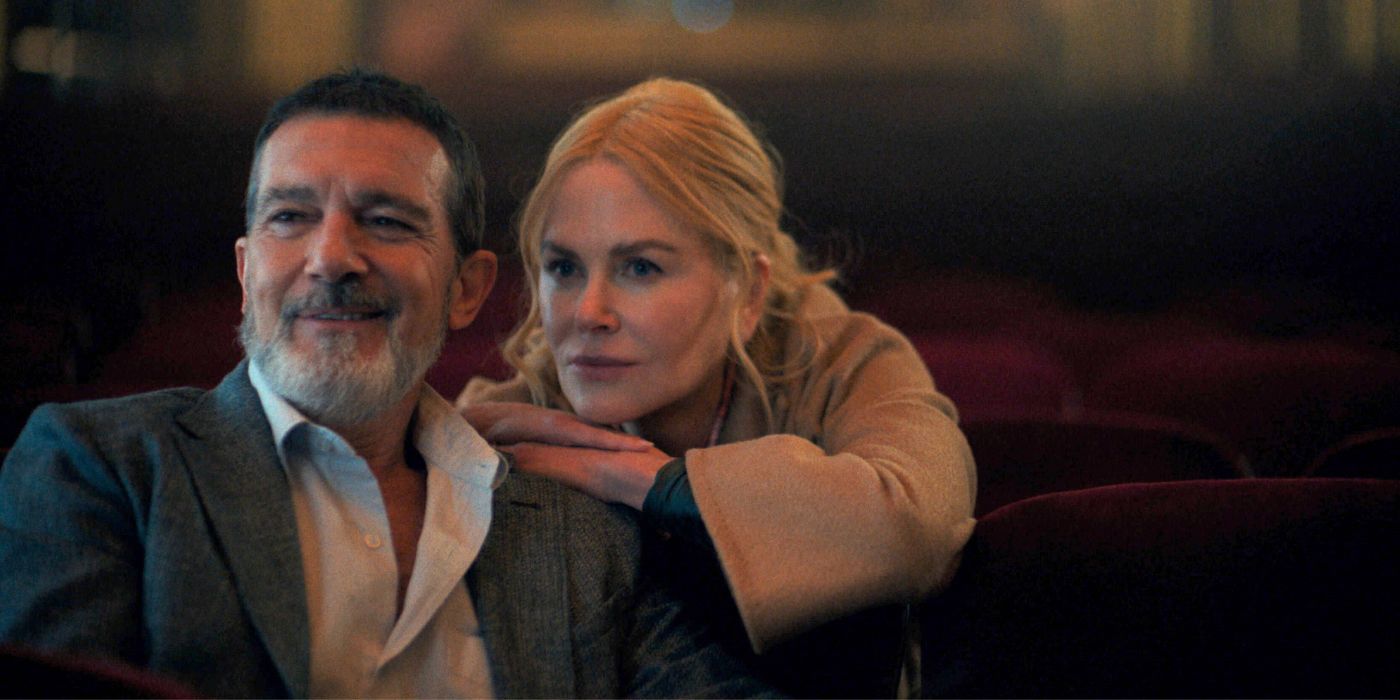 Antonio Banderas and Nicole Kidman sitting in an auditorium together in Babygirl.