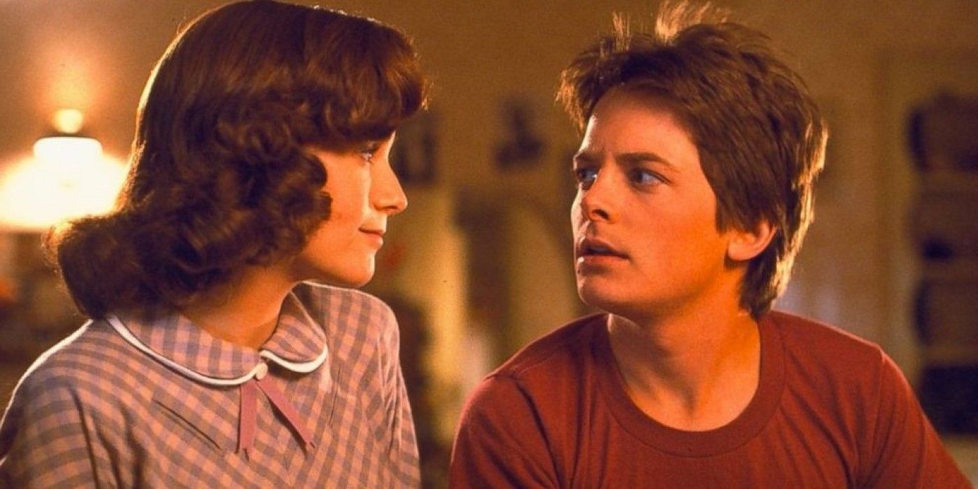 Lorraine Baines (Lea Thompson) looks at a confused Marty McFly (Michael J. Fox) in 'Back to the Future'