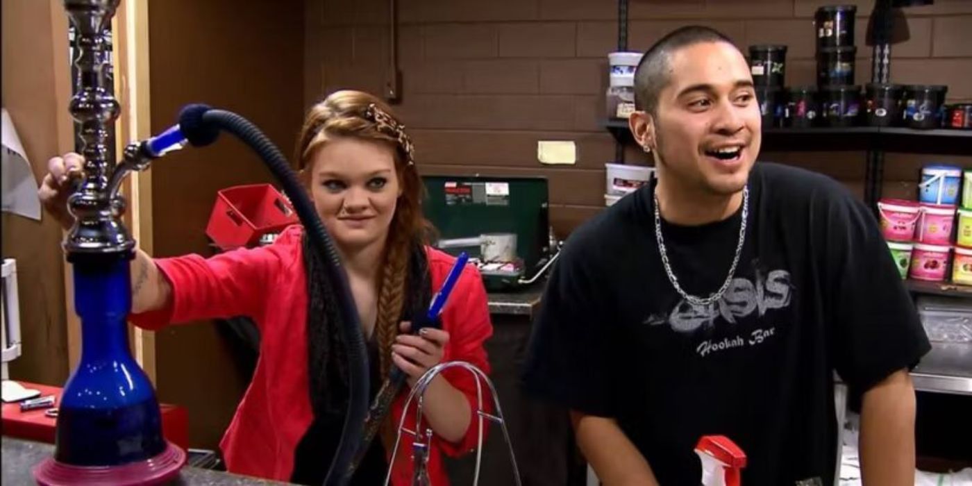Two employees at a hookah lounge smile on Bar Rescue
