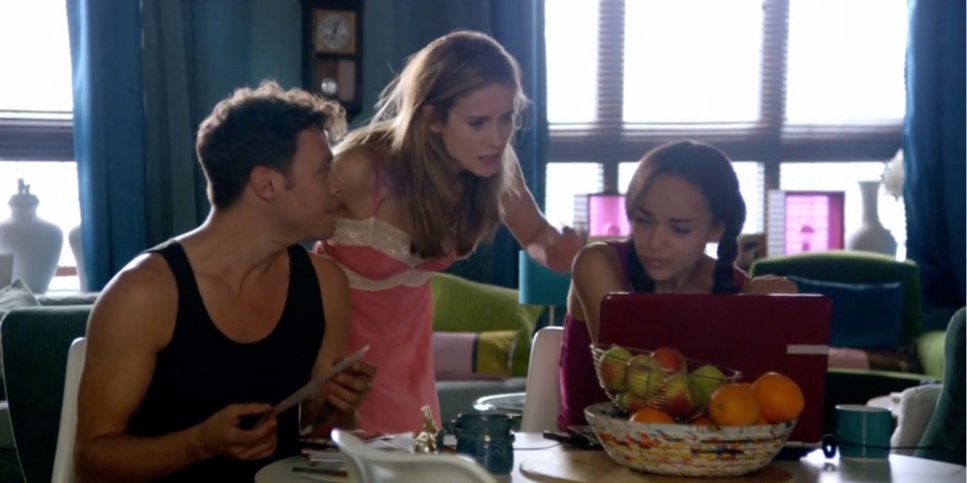 Kate, Ryan and Molly are in their apartment looking at a laptop.