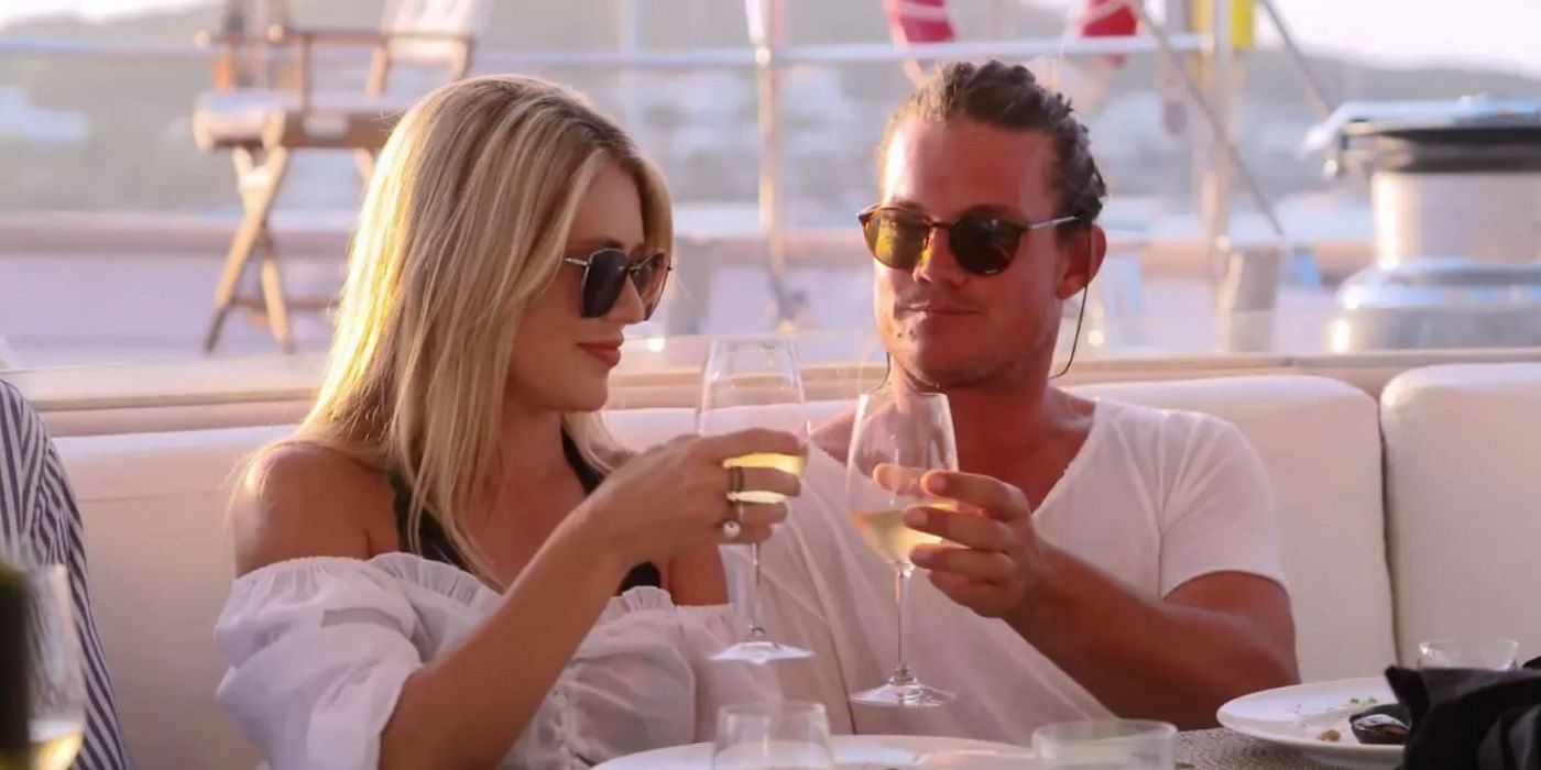 Scarlett Bentley and Gary King raise a toast in an episode of 'Below Deck Sailing Yacht.”