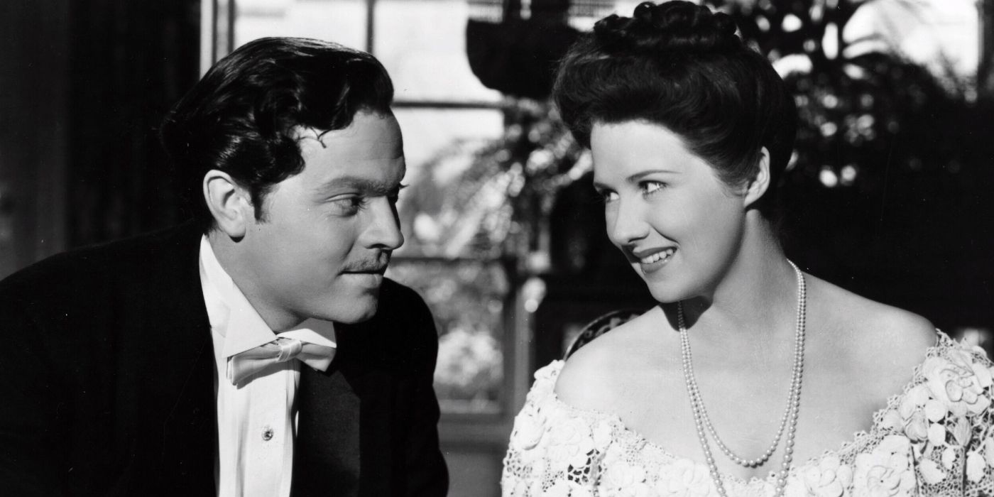 Orson Welles as Charles Kane smiling with Ruth Warrick as Emily in Citizen Kane.