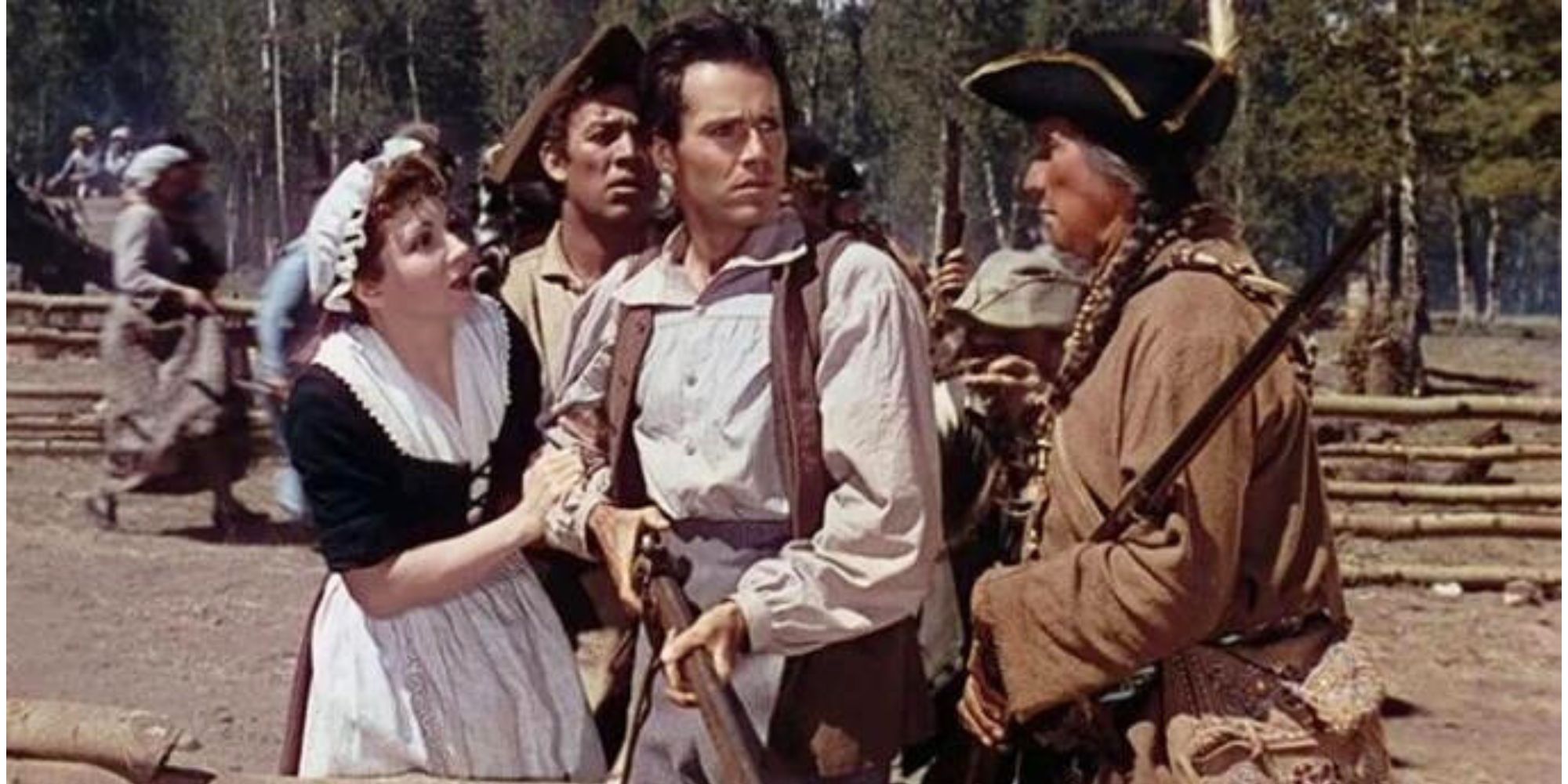 Claudette Colbert clinging to Henry Fonda in Drums Along the Mohawk (1939)