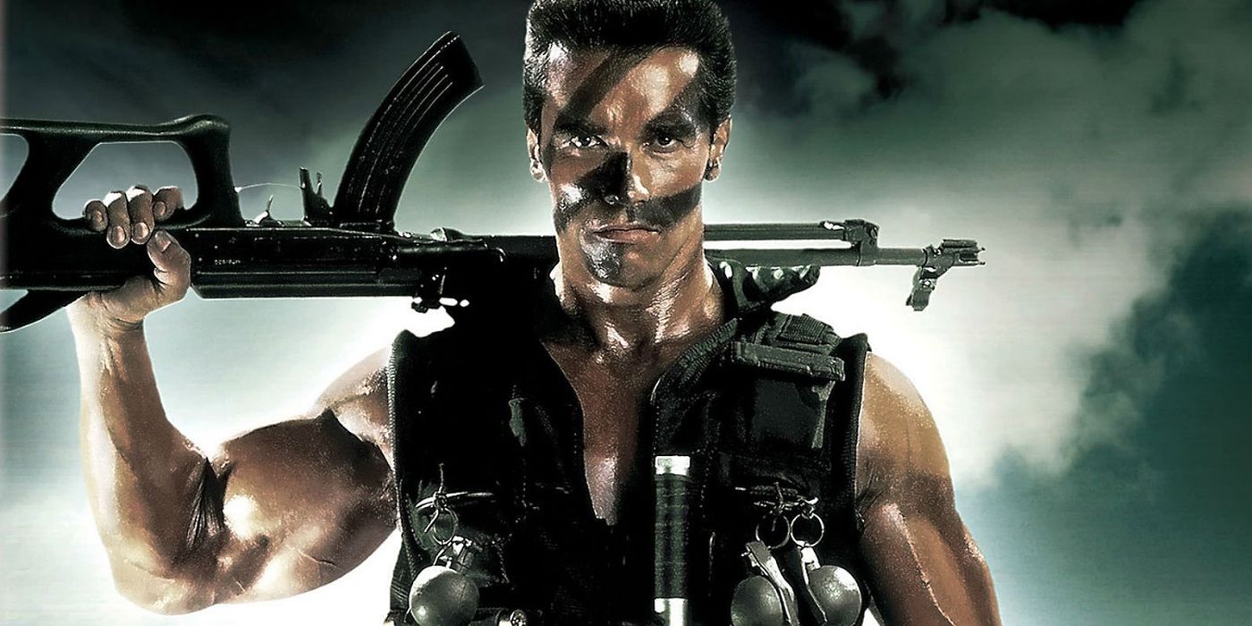 Arnold Schwarzenegger as John Matrix holding a gun in 'Commando'