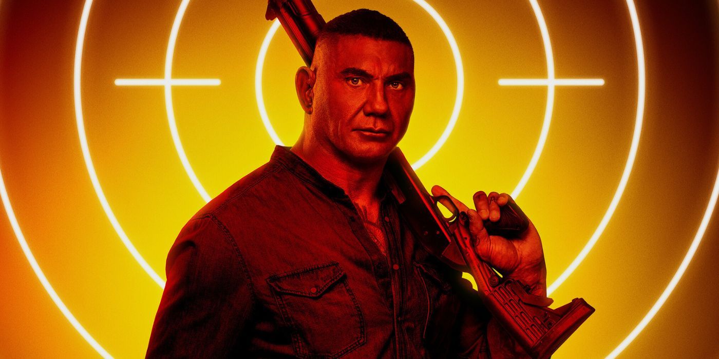 Dave Bautista holding a shotgun as Joe Flood on a character poster for The Killer's Game.