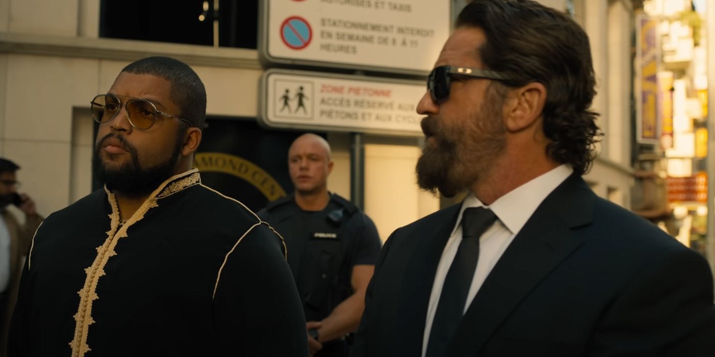 O'Shea Jackson Jr and Gerard Butler in formal attire wearing sunglasses in Den of Thieves 2: Pantera.