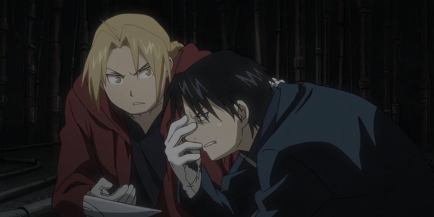 Edward kneeling next to Mustang in pain in Fullmetal Alchemist: Brotherhood