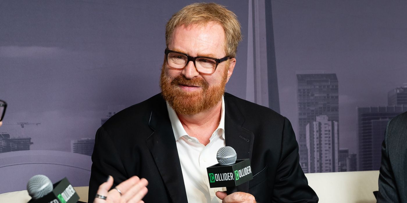 RJ Cutler at TIFF 2024 holding a mic for Elton John: Never Too Late
