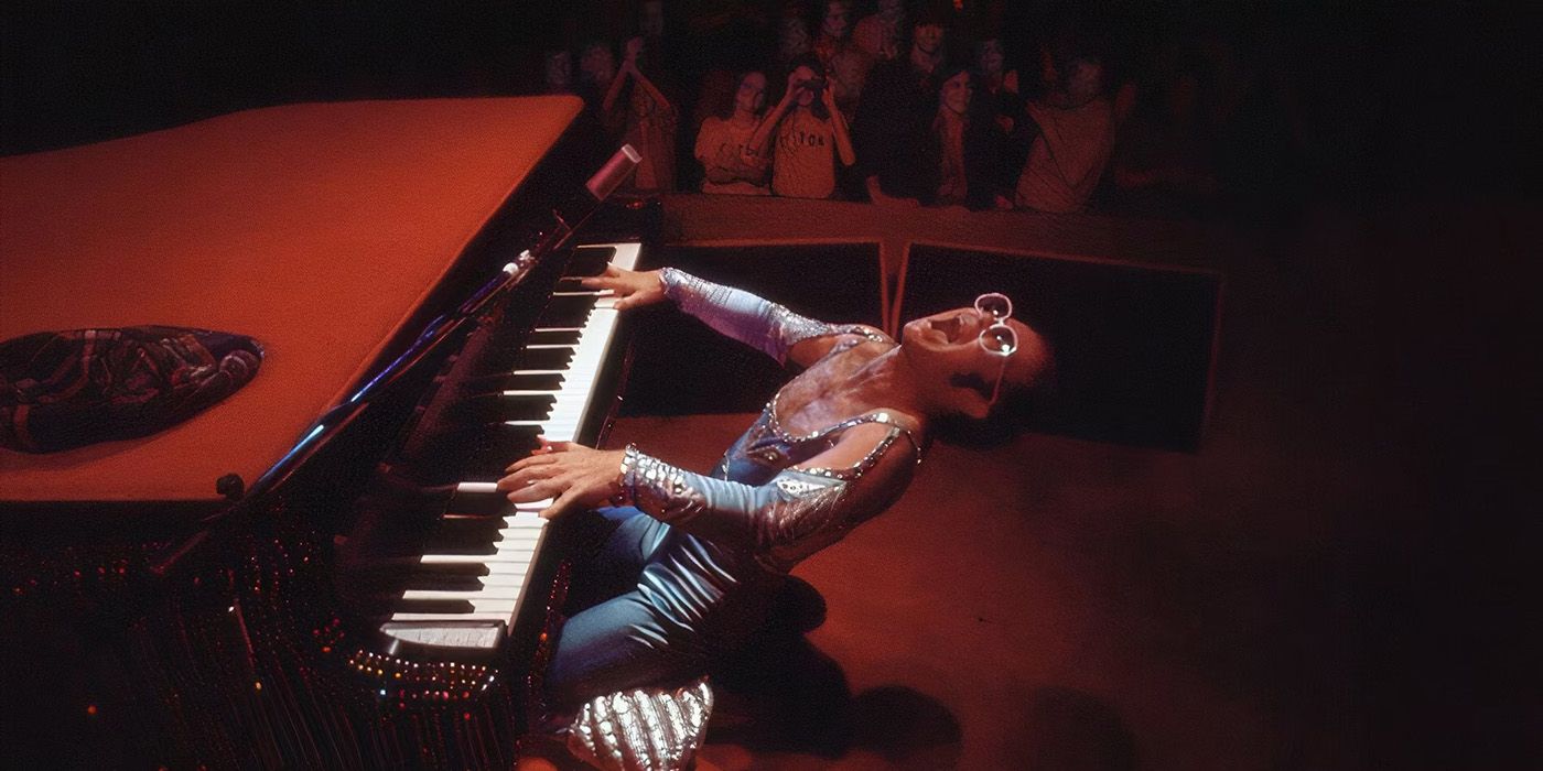 Elton John at the piano, with his head back and mouth open, in &lsquo;Elton John: Never too Late&rsquo;