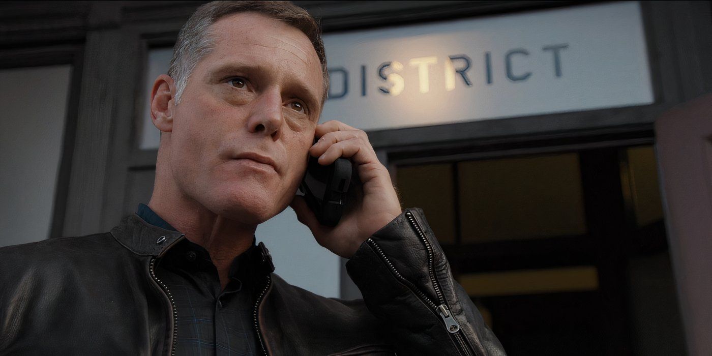 Jason Beghe as Sergeant Hank Voight standing outside the 21st district, on the phone, in Chicago P.D.