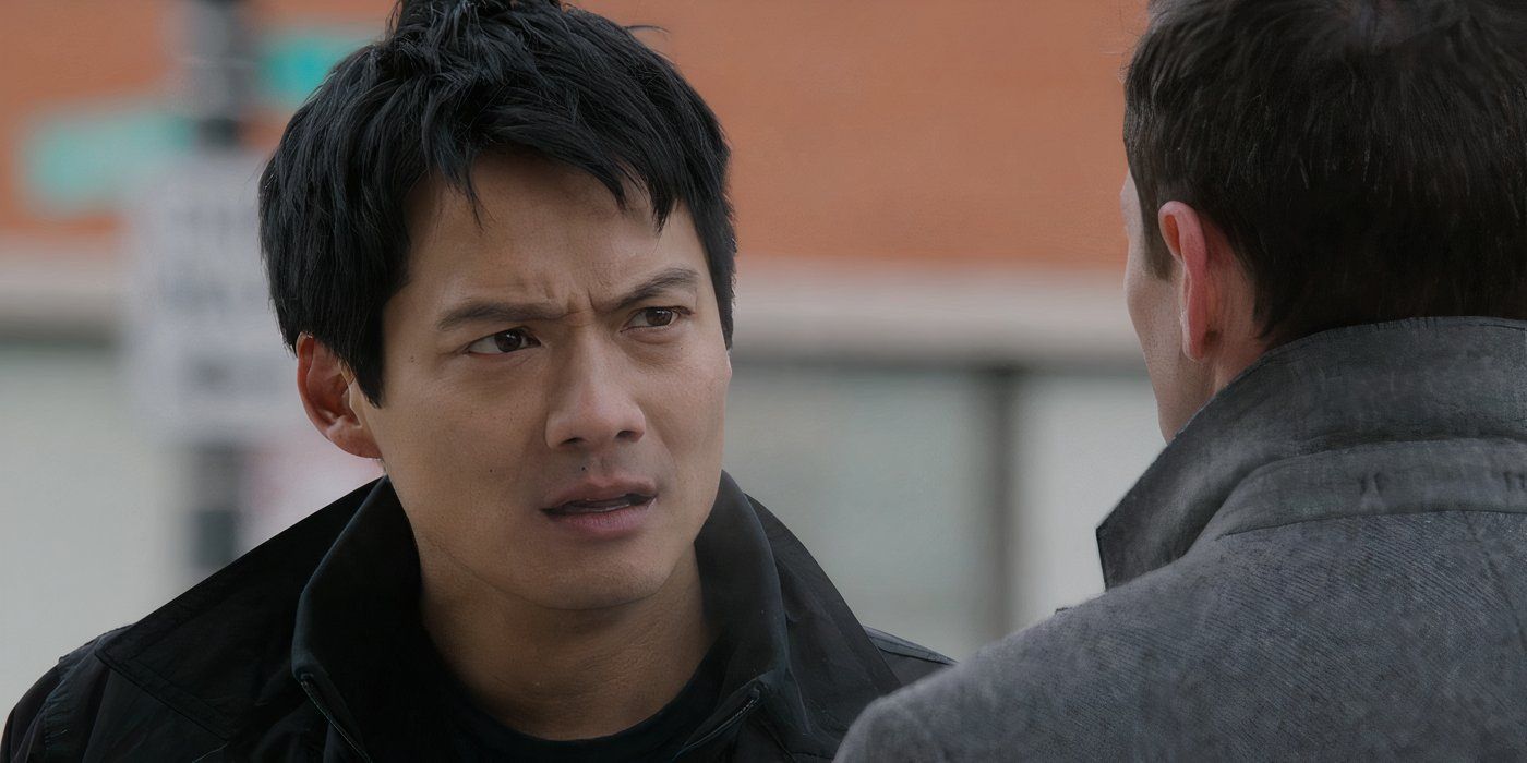 Archie Kao as Sheldon Jin talking to a man outside in Chicago P.D.