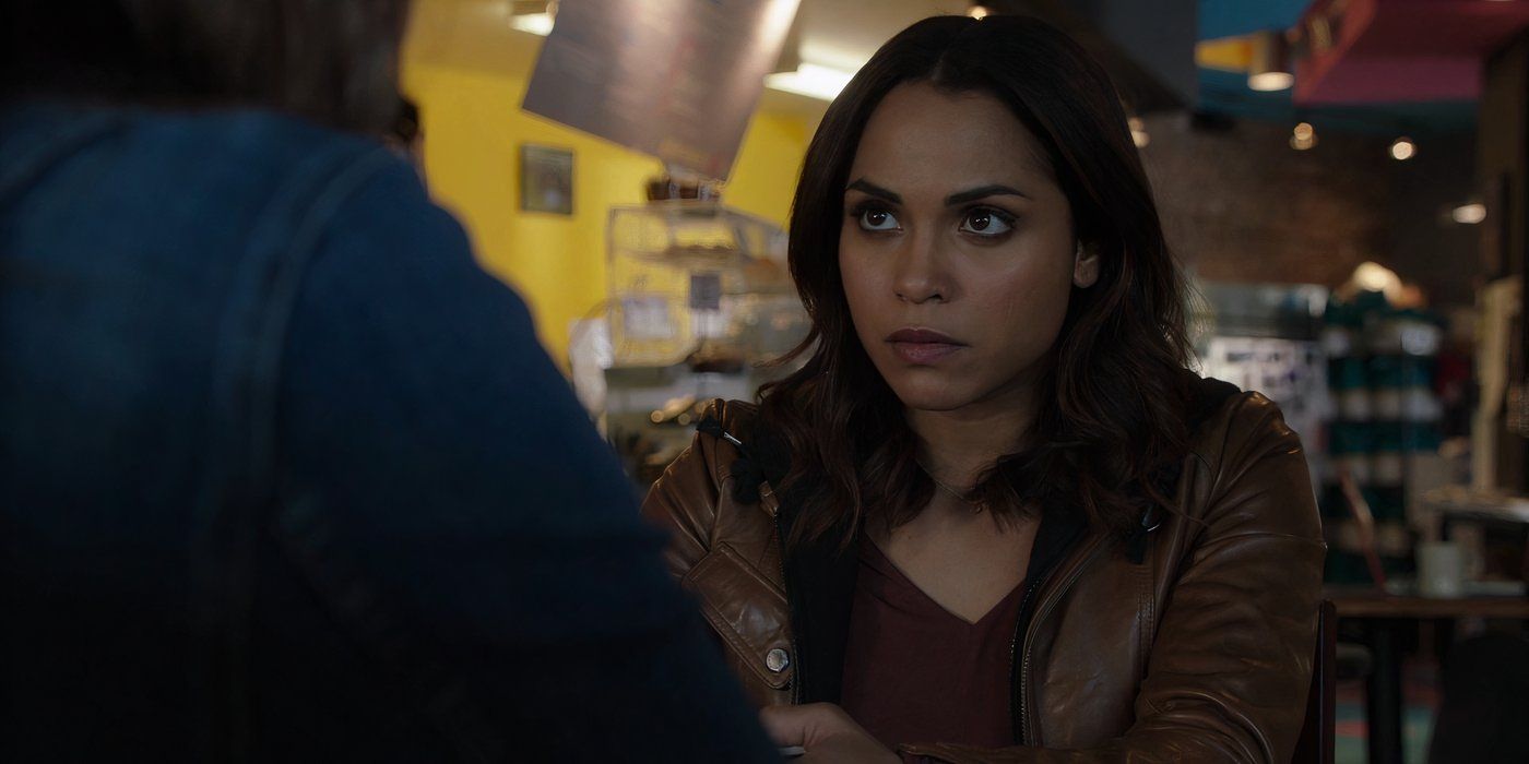 Monica Raymund as Gabby Dawson in a coffee shop in Chicago Fire.