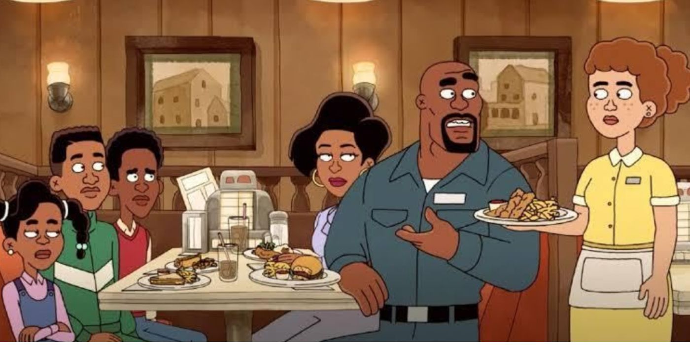 Chris and his family eating at a dinner in a still from 'Everybody Still Hates Chris'.