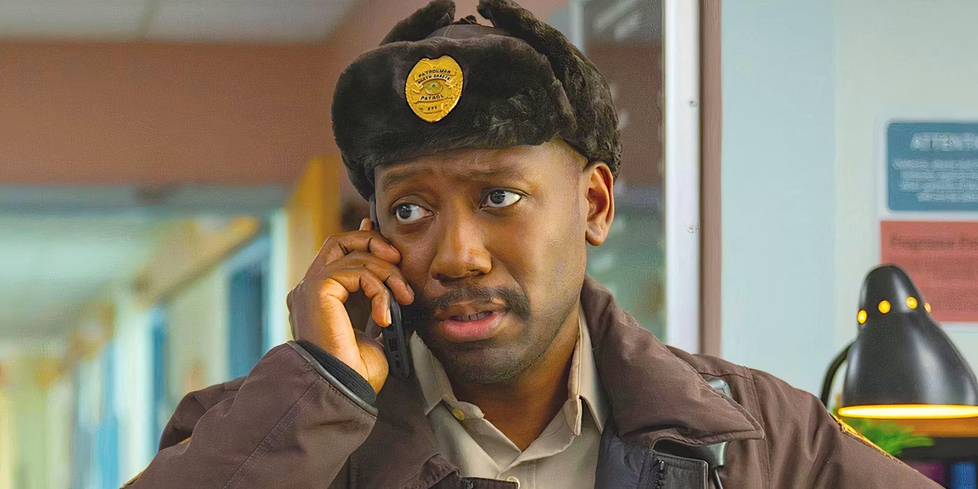 Lamorne Morris talks on a phone and wears an officer&rsquo;s uniform and hat in Season 5 of Fargo.